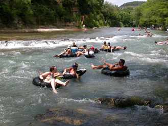 More Fun Rapids near the Tuber exit point on the Horseshoe Loop section of the Guadalupe River, TubeHaus.com  (830) 964-3011